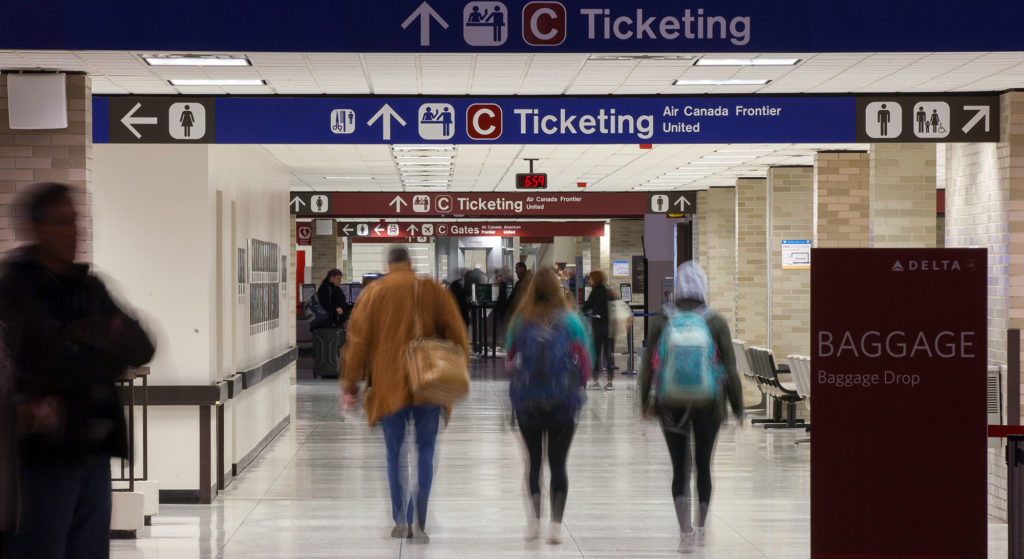 Passengers walk to C ticketing